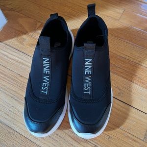 Nine West Athletic women shoes size 7 1/2 M black and silver slip on no laces